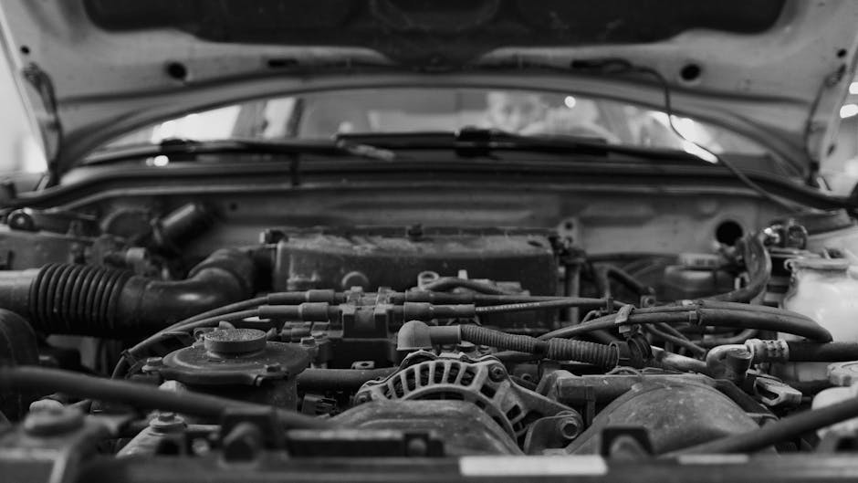 Мастерская RestoWorks: механик за работой над классическим автомобилем